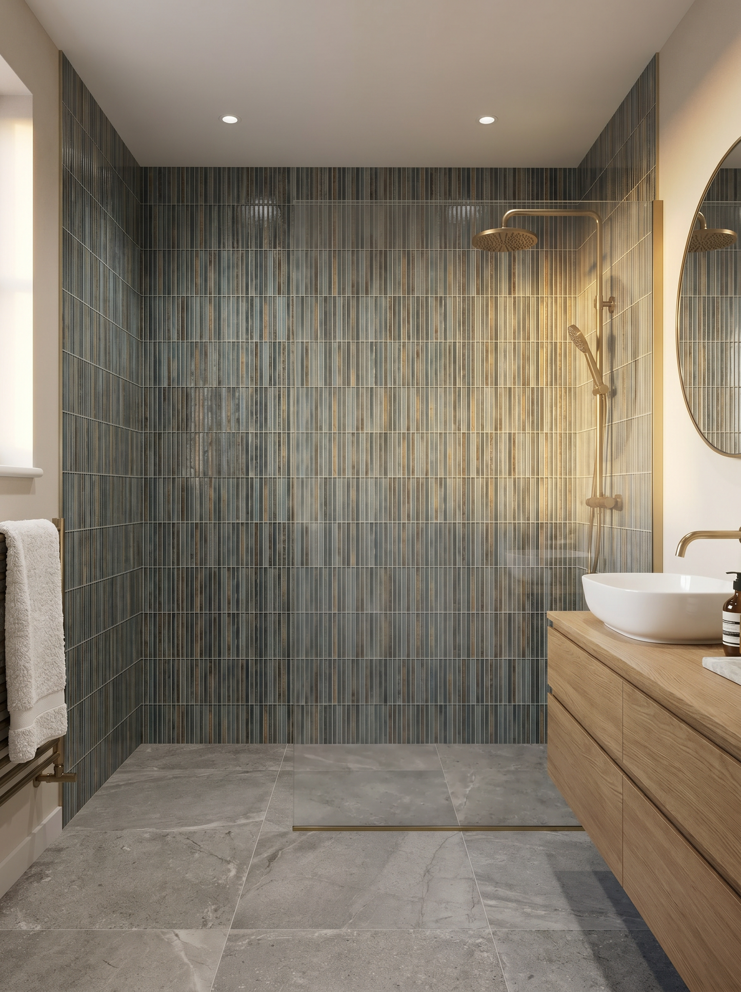 Modern bathroom with tiled shower, wooden vanity, and round mirror.