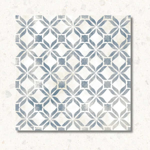 Decorative tile with geometric pattern on a textured surface